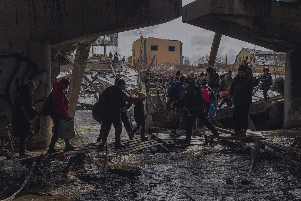 Civilian evacuation across Irpin River during the Ukraine War.