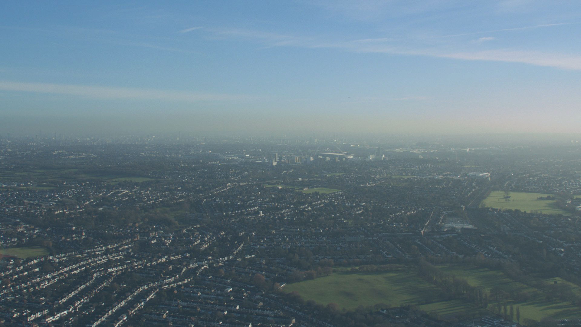 An aerial view across West London towards Grenfell Tower