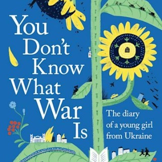 A book cover shows an illustration of a sunflower against a blue background.