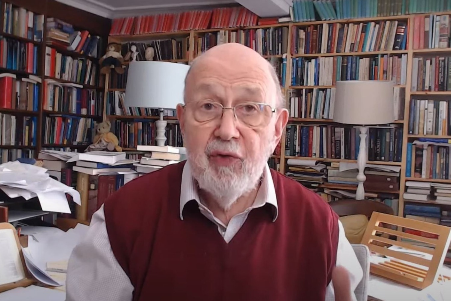 A man talks to a camera.