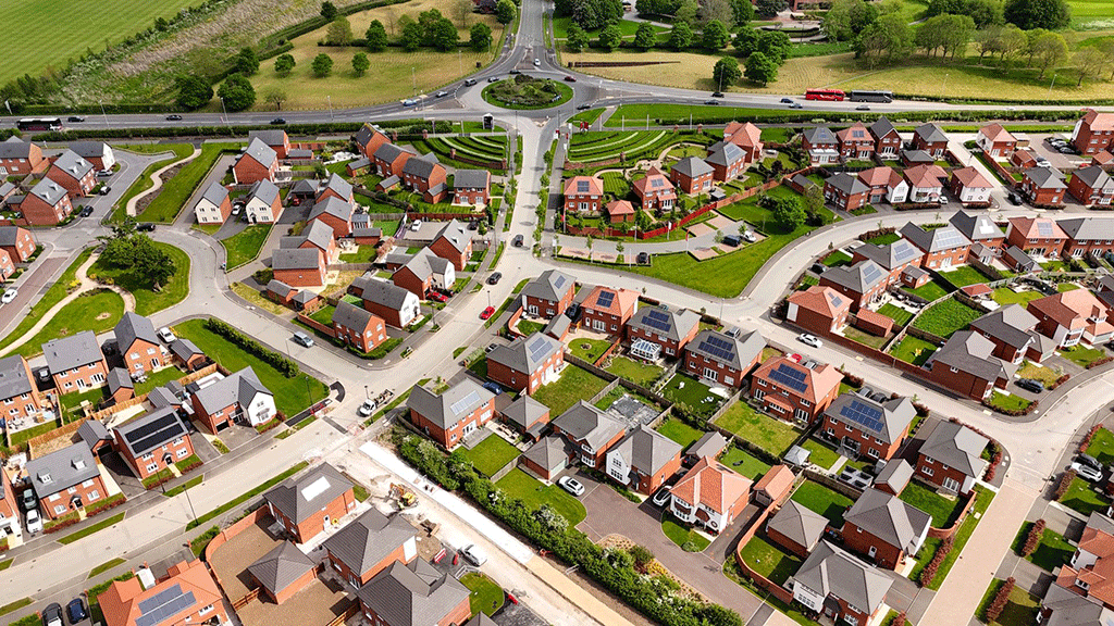A CGI of a new housing estate viewed from above. 