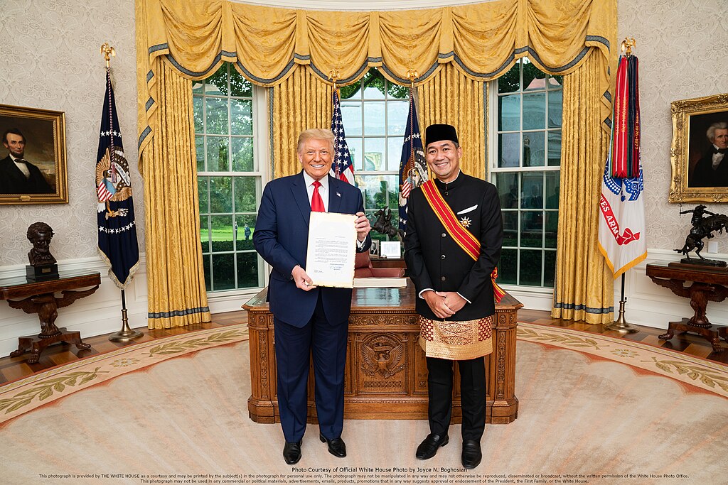 An ambassador presents credential to President Trump