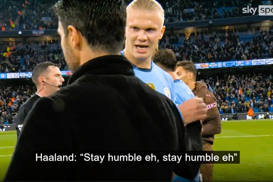 A TV screengrab shows a football manager walking while a passing rival player says (captioned) 'stay humble'.