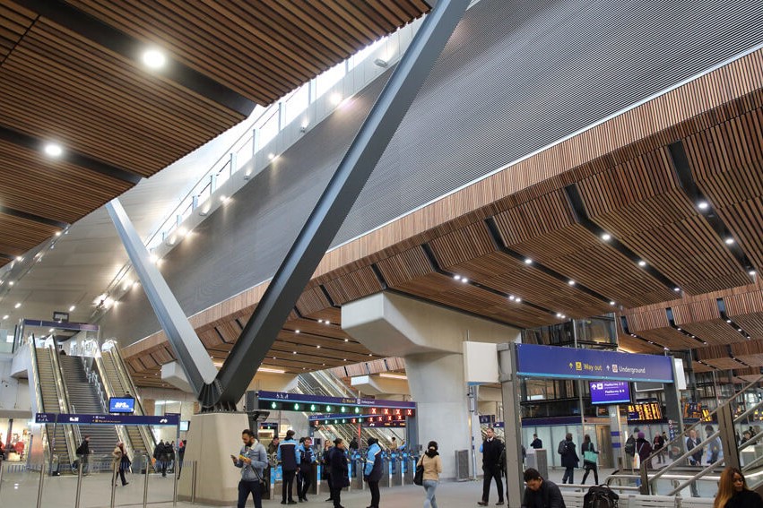 A station concourse with a light well above.