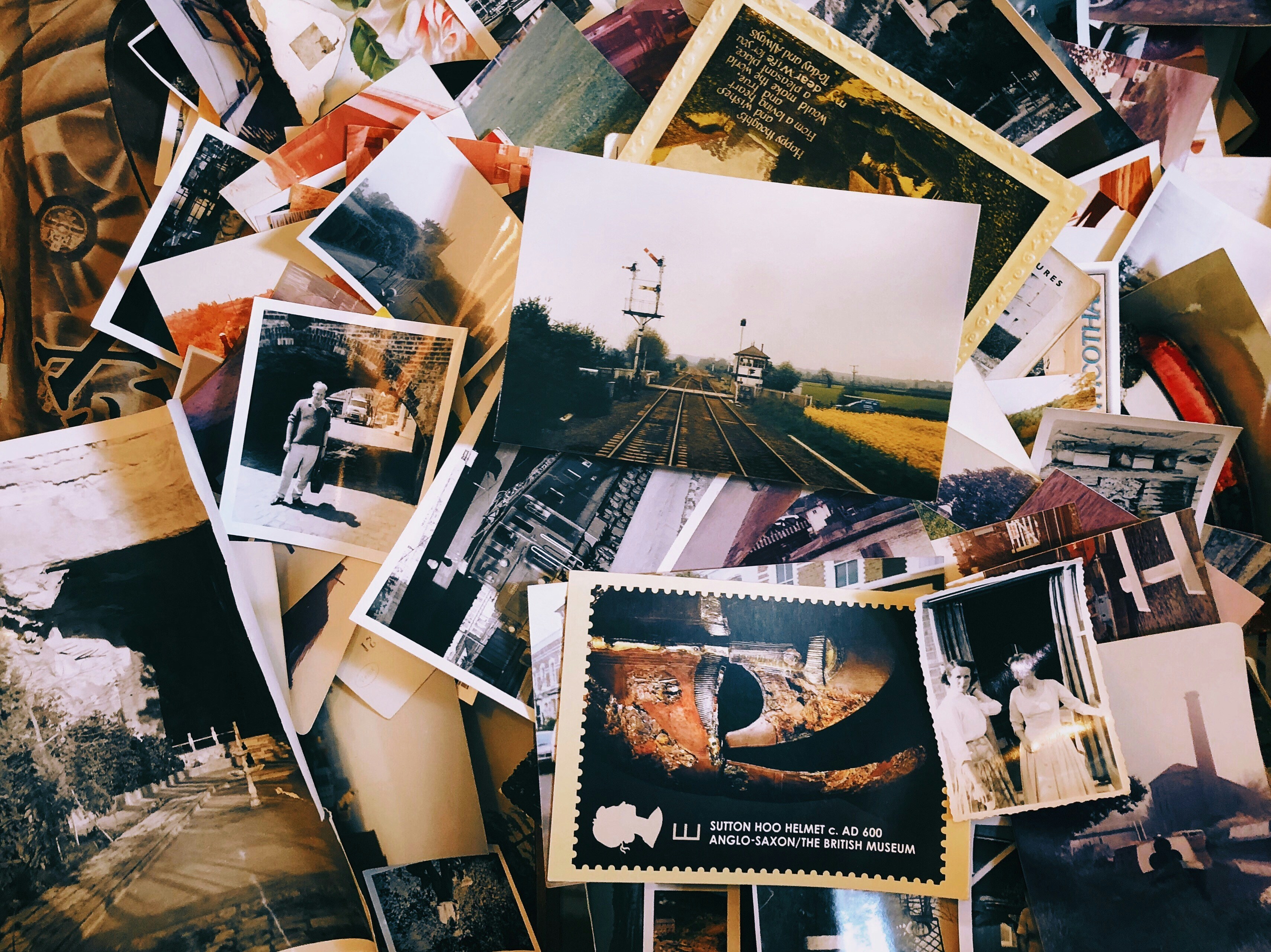 A jumbled pile of old photographs.
