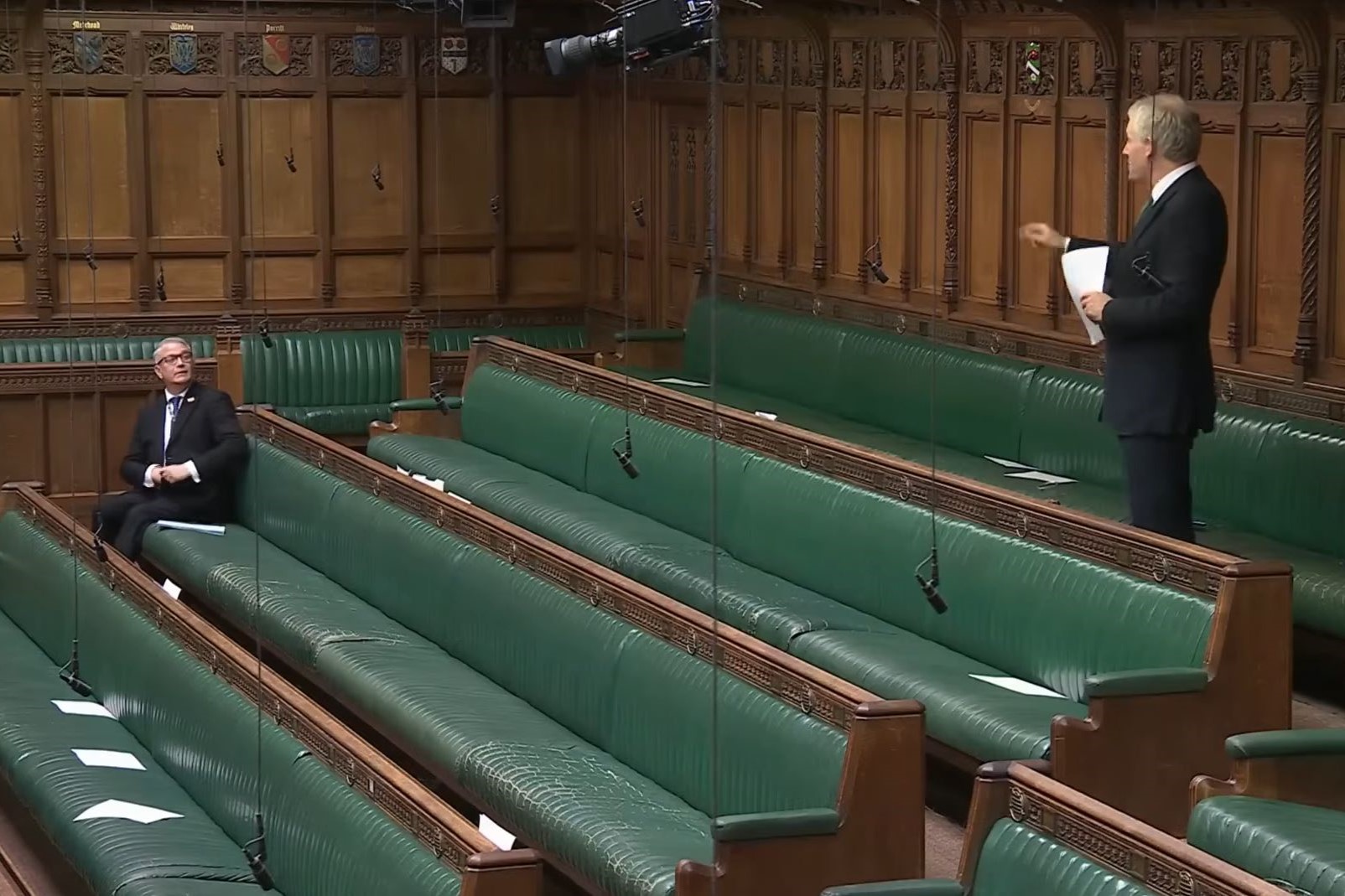 A backbench MP stands in an almost empty chamber and speaks