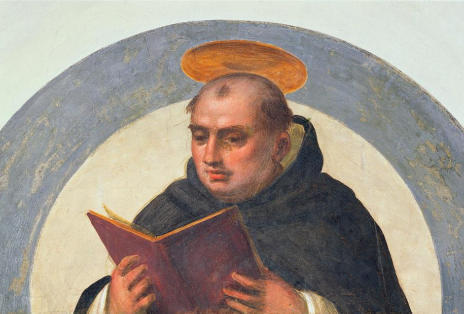 Thomas Aquinas reads.