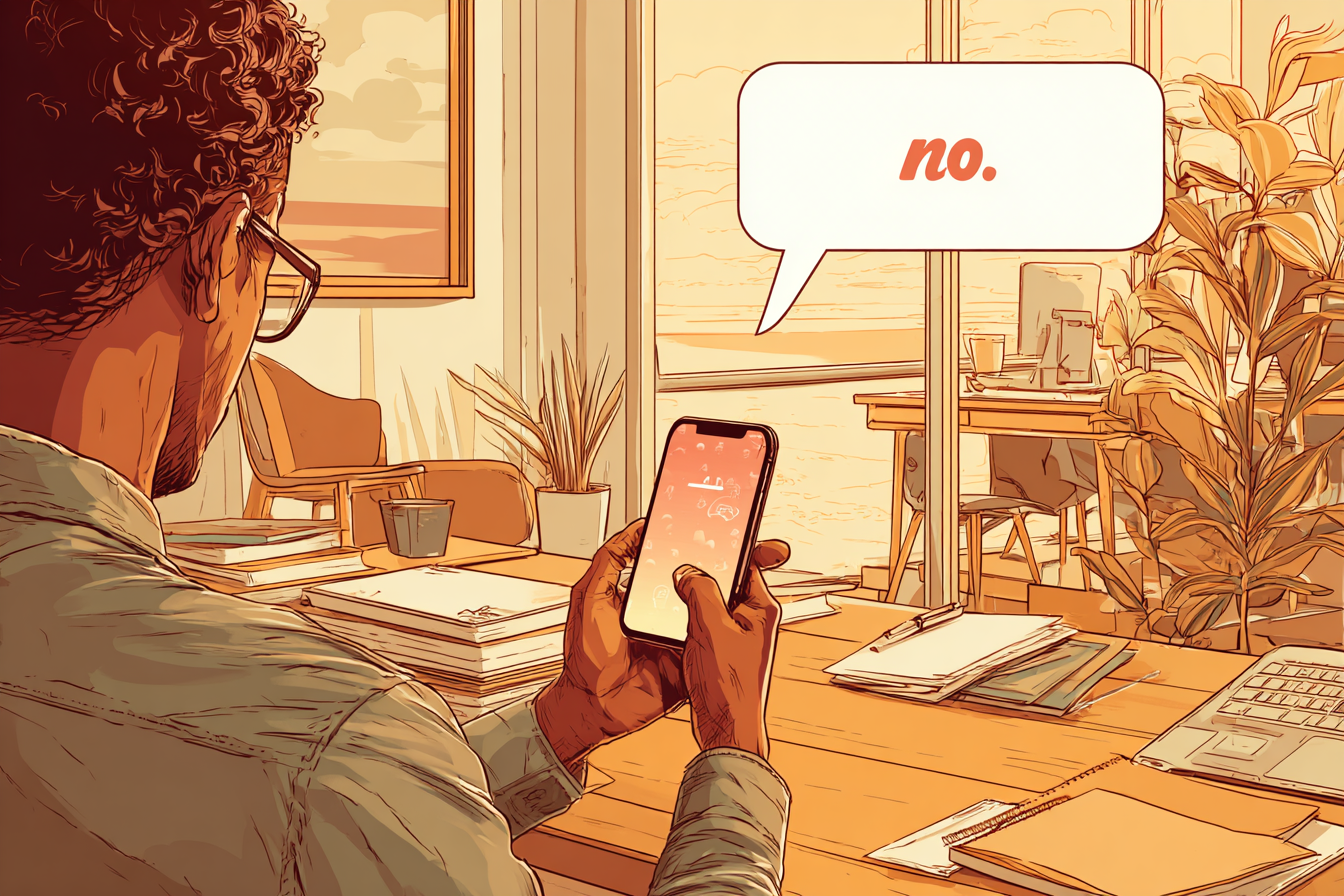 A person hold their phone on their desk, a think bubble from it says 'no'.