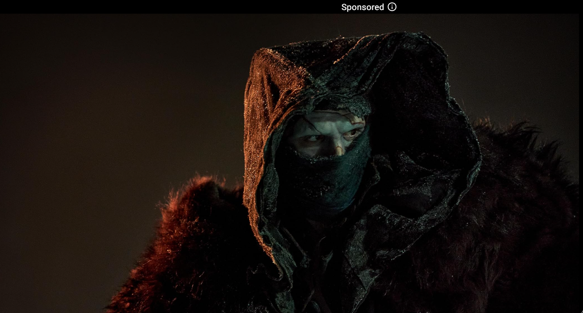 Frankstein stares our from his covered face.