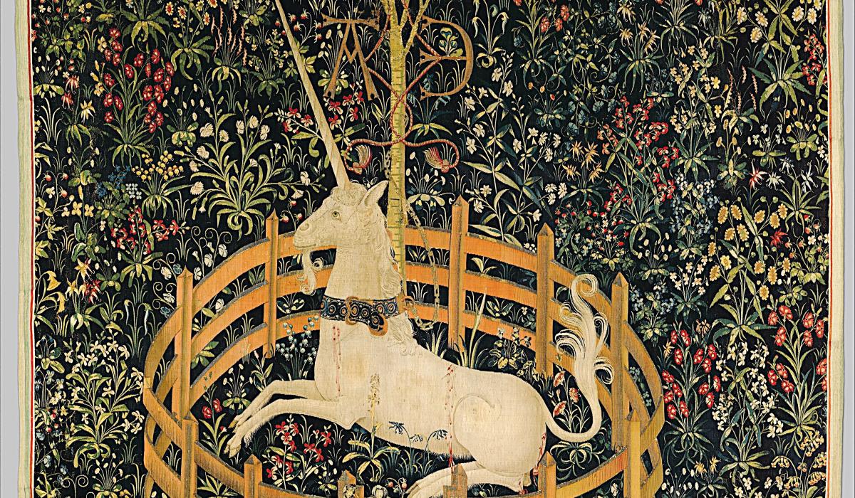 A tapestry depicts a unicorn resting within a fenced enclosure.