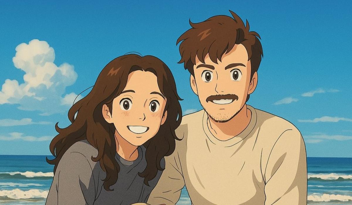 A couple crouch together on a beach in a Studio Ghibli style image.