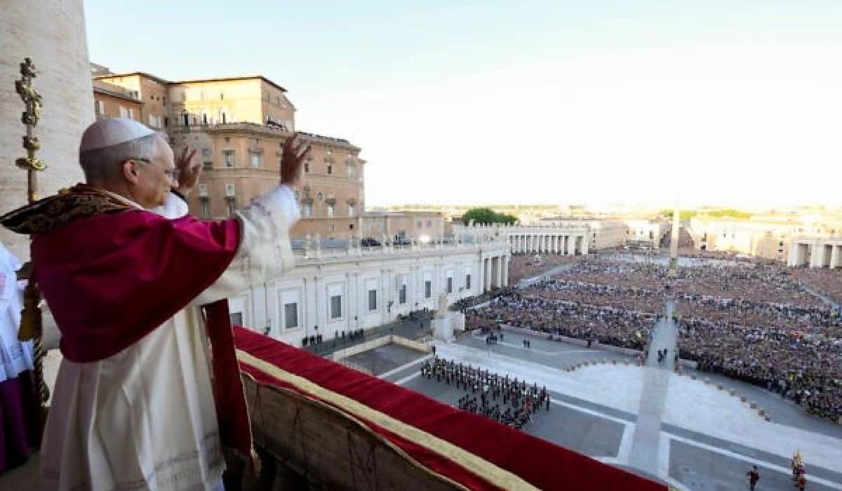Pope Leo waves to the crowd.