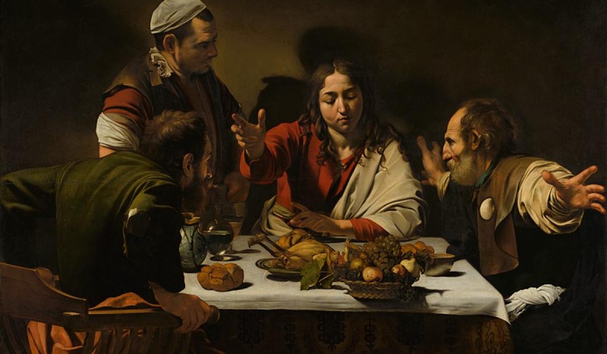 A painting depicts Jesus talking to disciples at a meal.