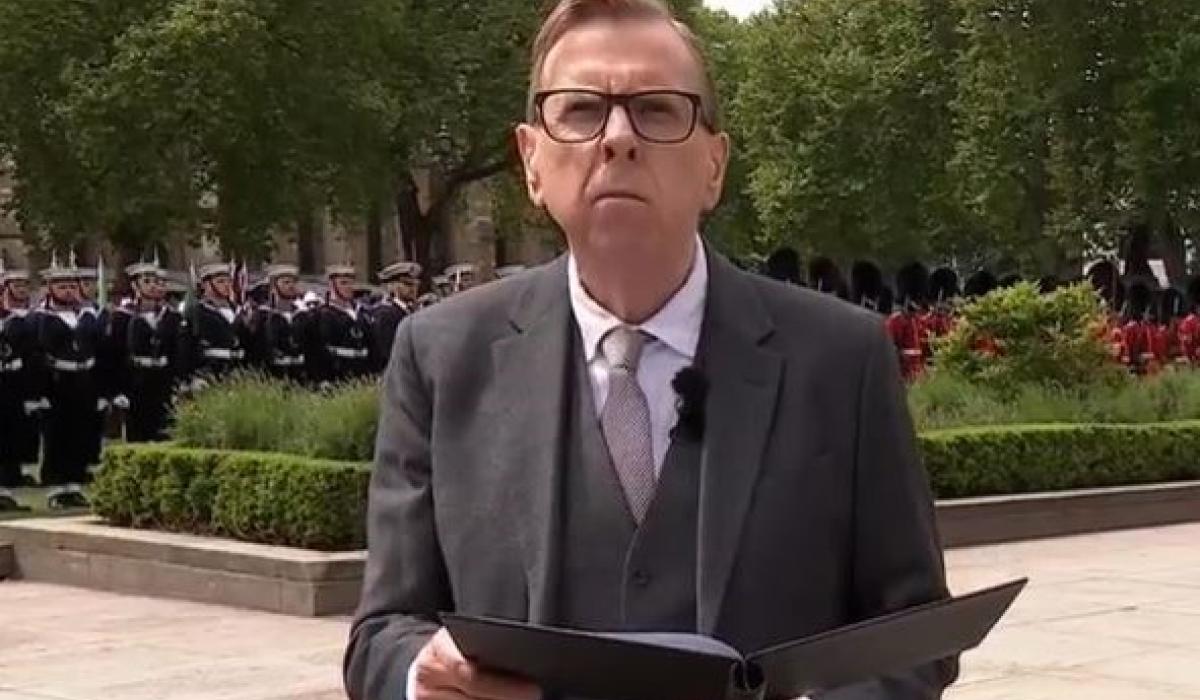 An actor reads a speech at a commemoration