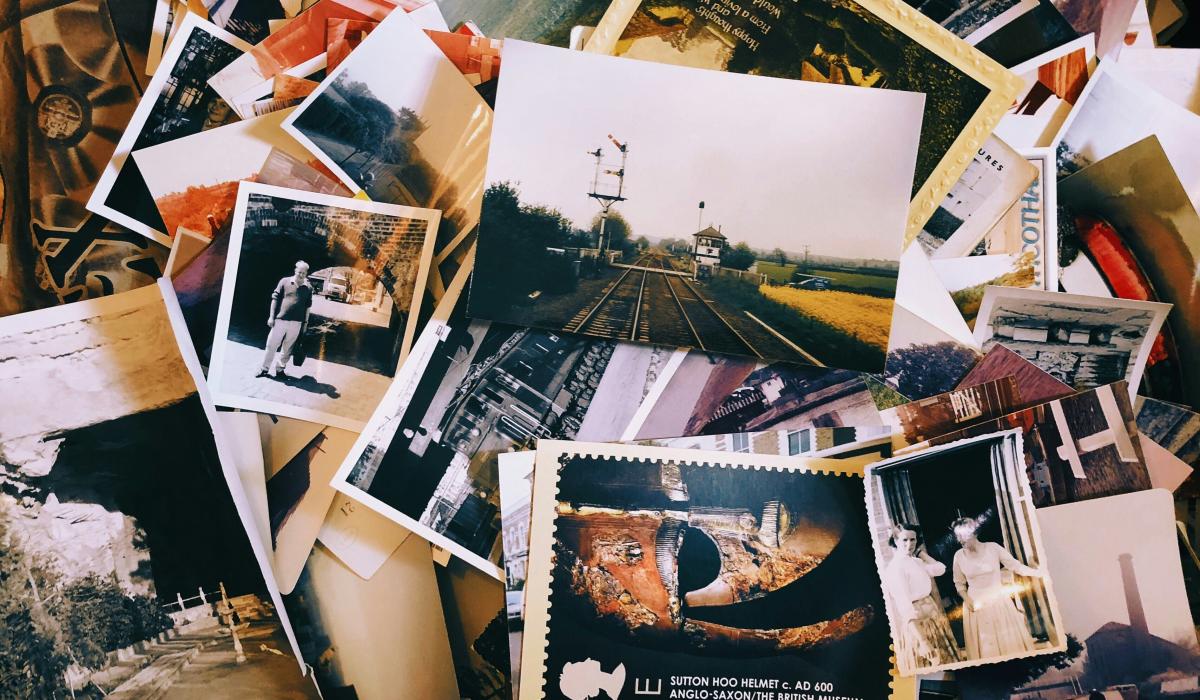 A jumbled pile of old photographs.