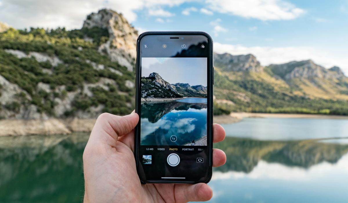 A phone shows a picture of the real view behind it. 