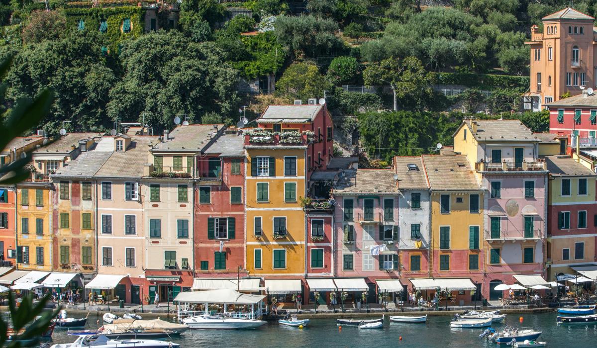 A colourful row of buildings in an Italian port.