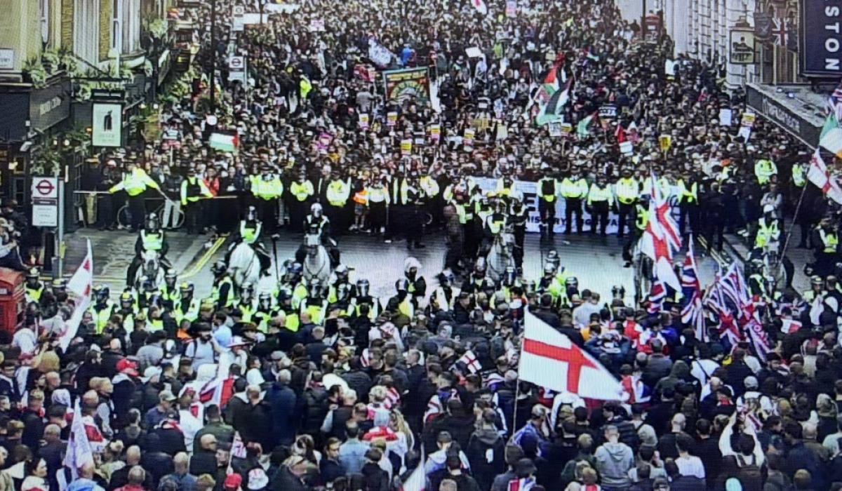 CCTV footage show two rival protests divided by a line of riot police.