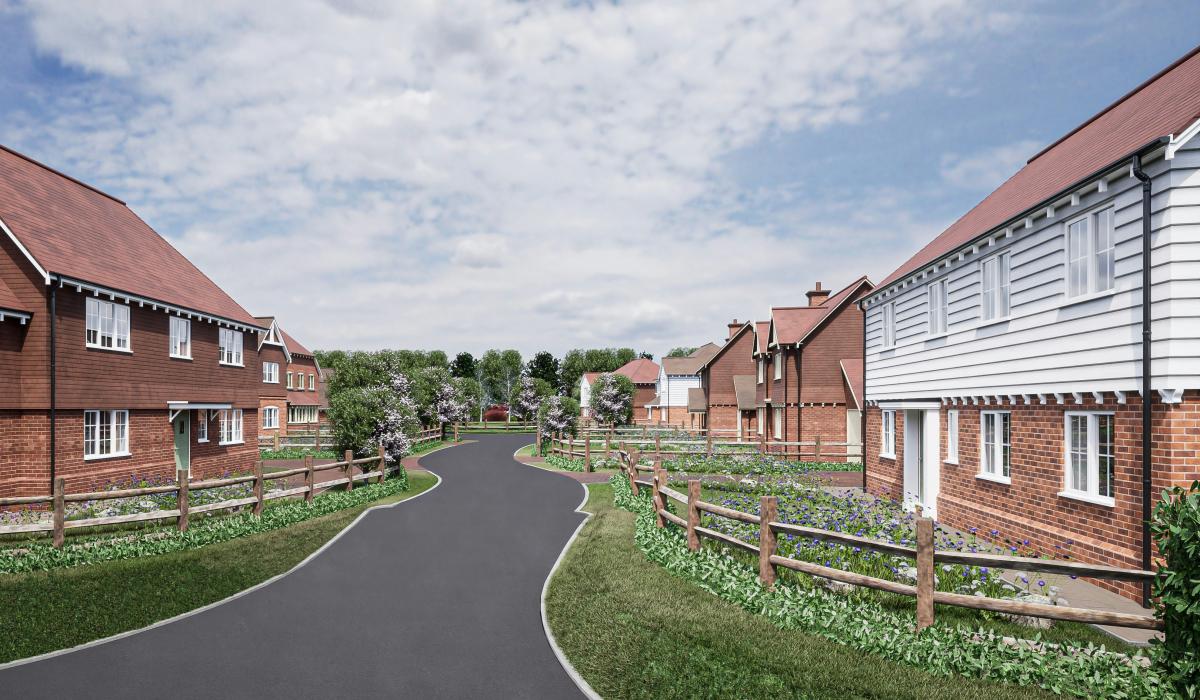 A render of a new housing estate showing a road, wooden fences and clapperboard hosues.