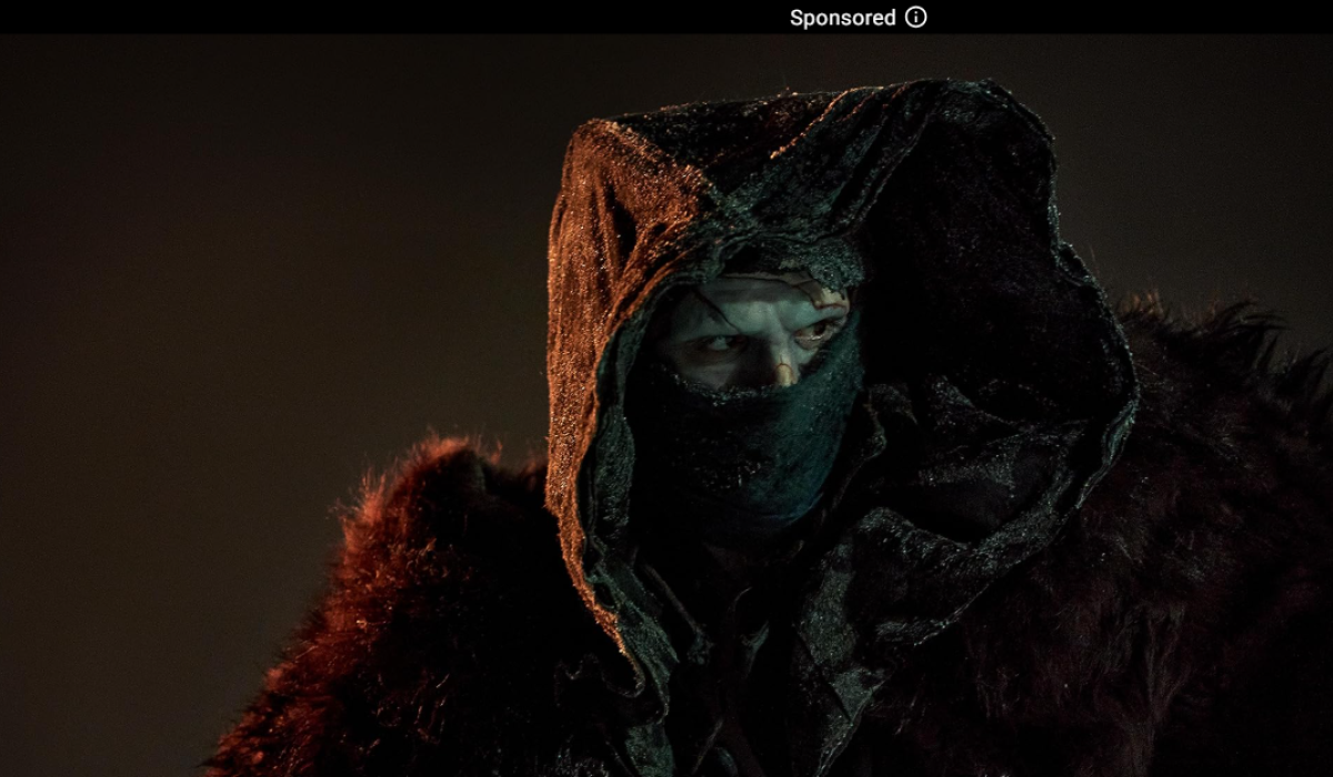 Frankstein stares our from his covered face.