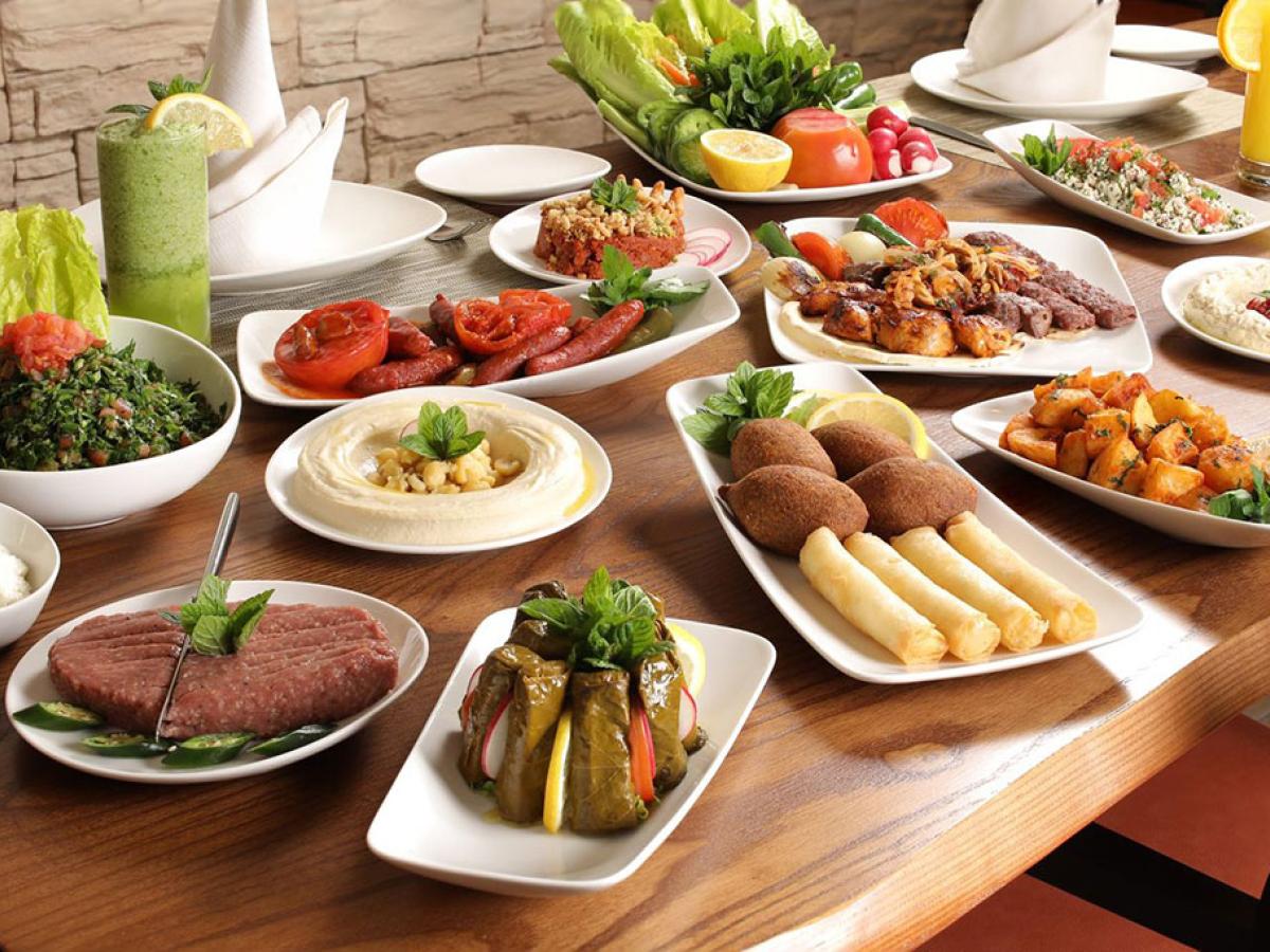 a Lebanese meal of many dishes displayed on a table.