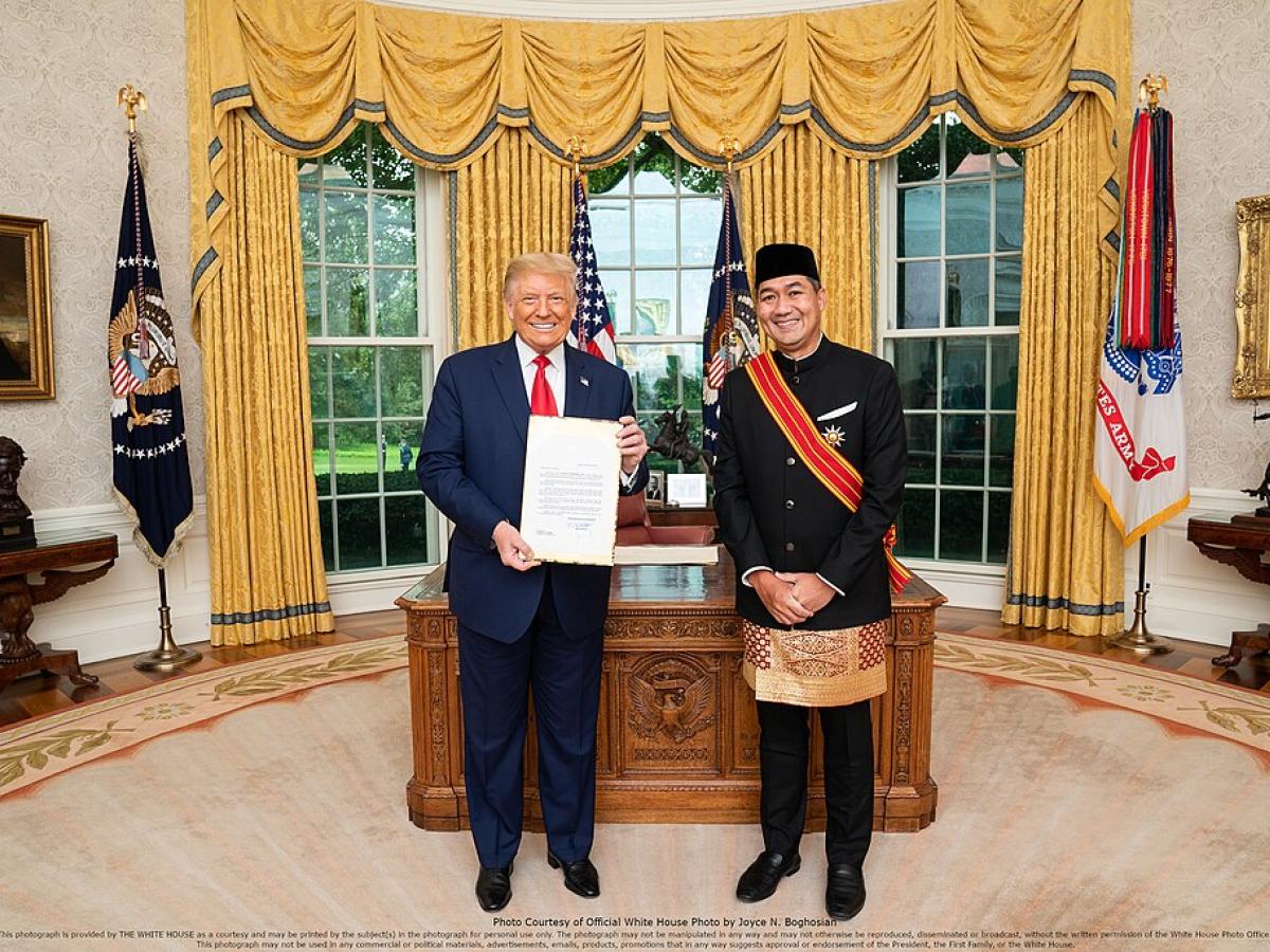 An ambassador presents credential to President Trump