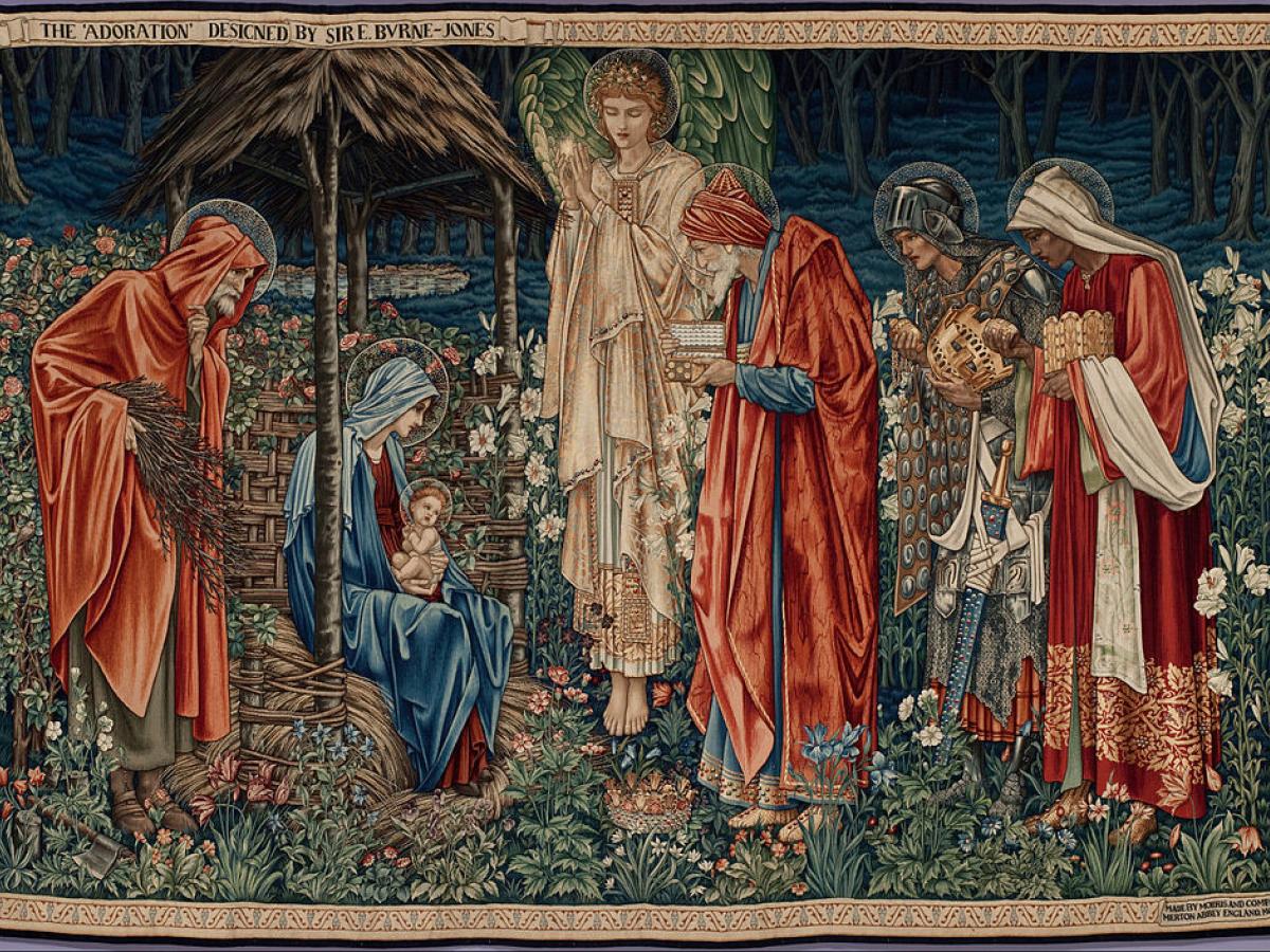 An arts and crafts image of the three kings adoring the new born Christ.