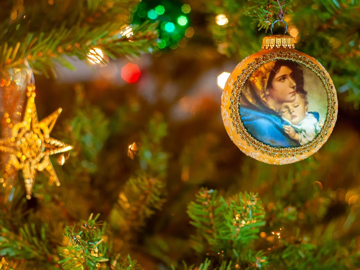 A Christmas tree bauble depicts the Virgin and Child.