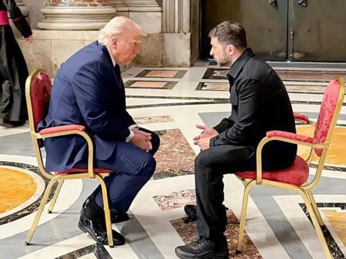 Trump and Zelensky sit and face each other.