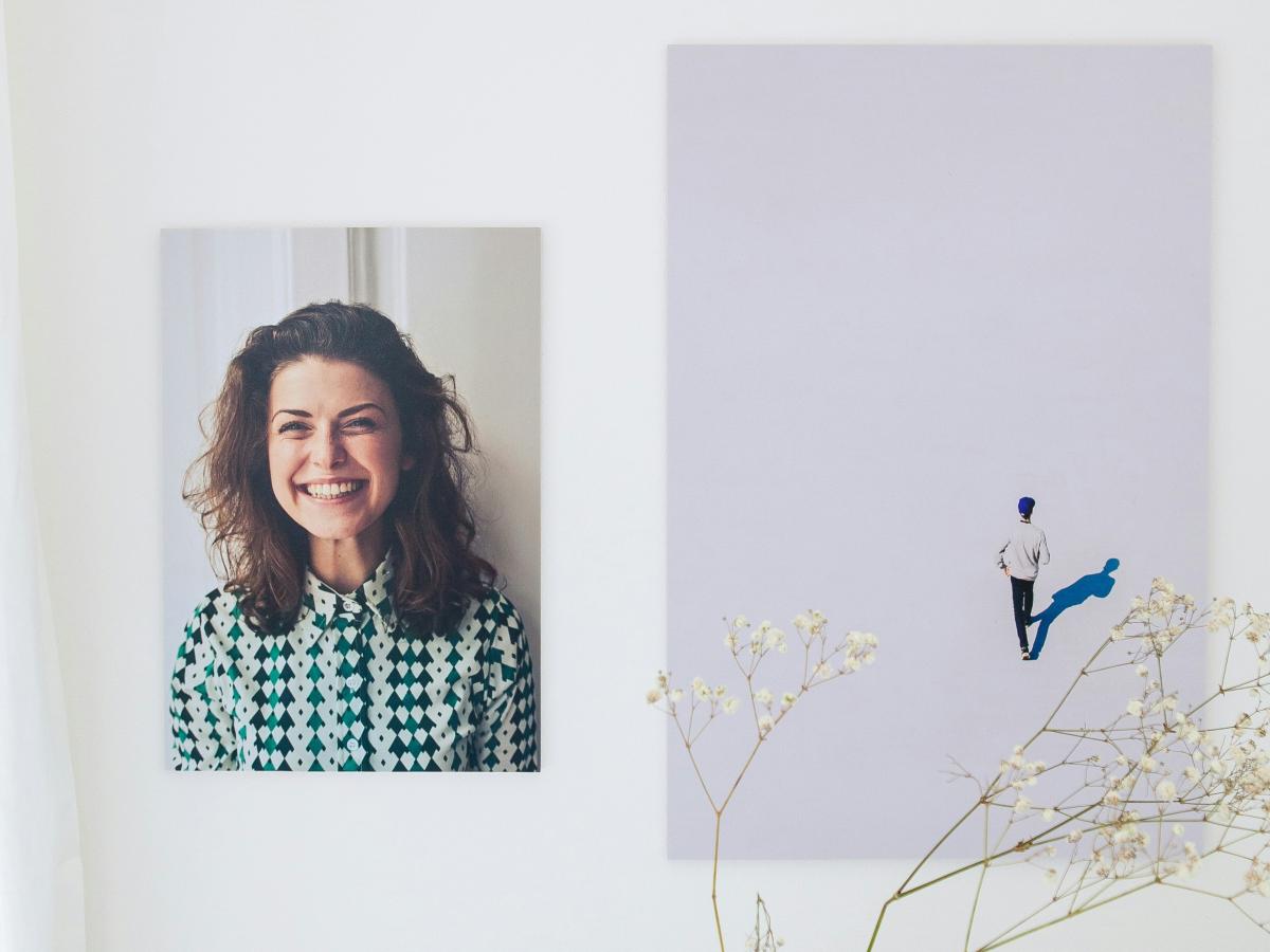 A composite show a smiling woman next to a small illustrate of someone walking off into the distance.