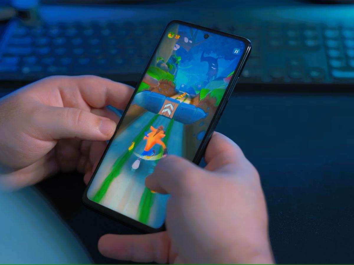 A gamer plays on a phone.