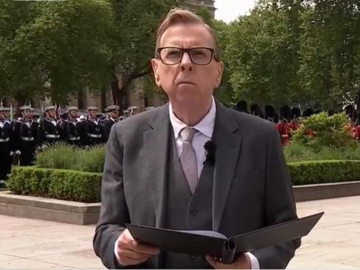 An actor reads a speech at a commemoration
