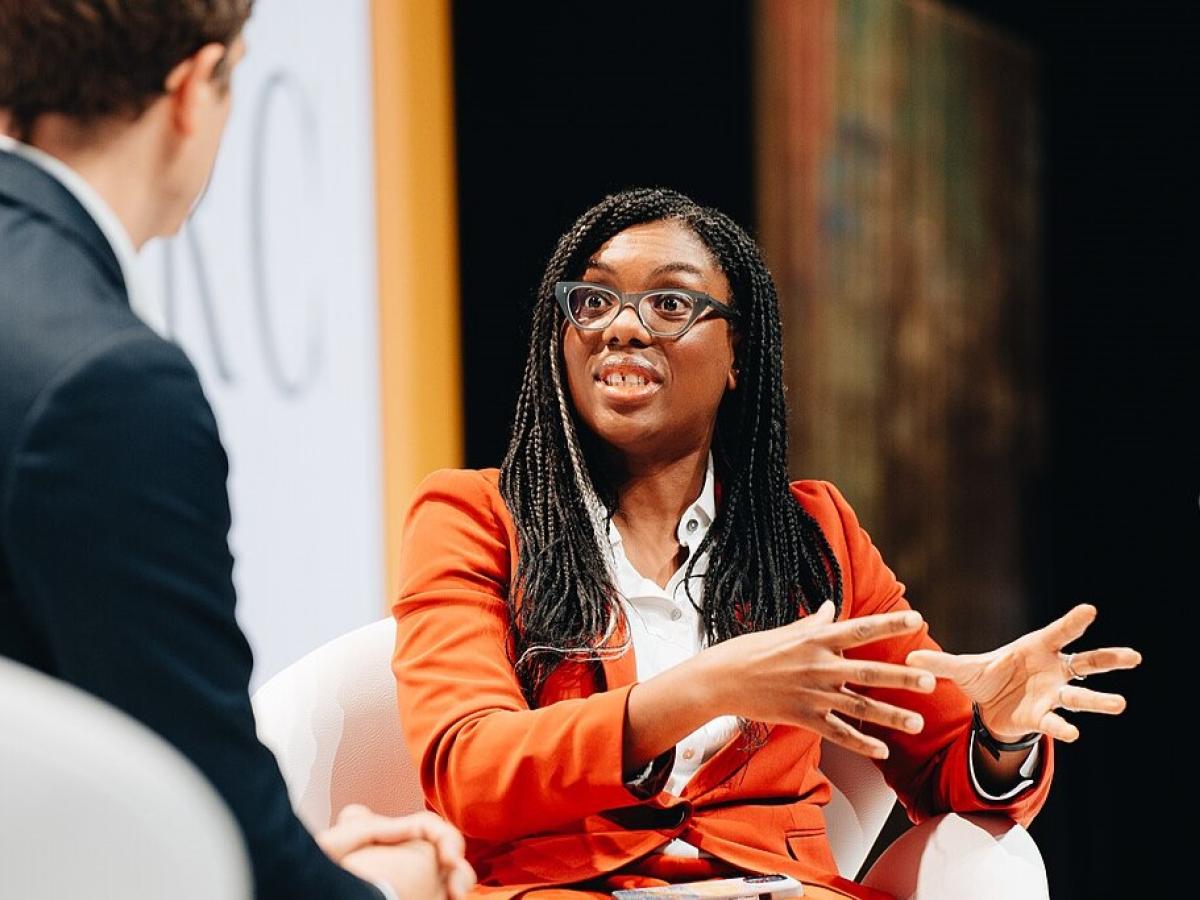 Kemi Badenoch sits and talks.