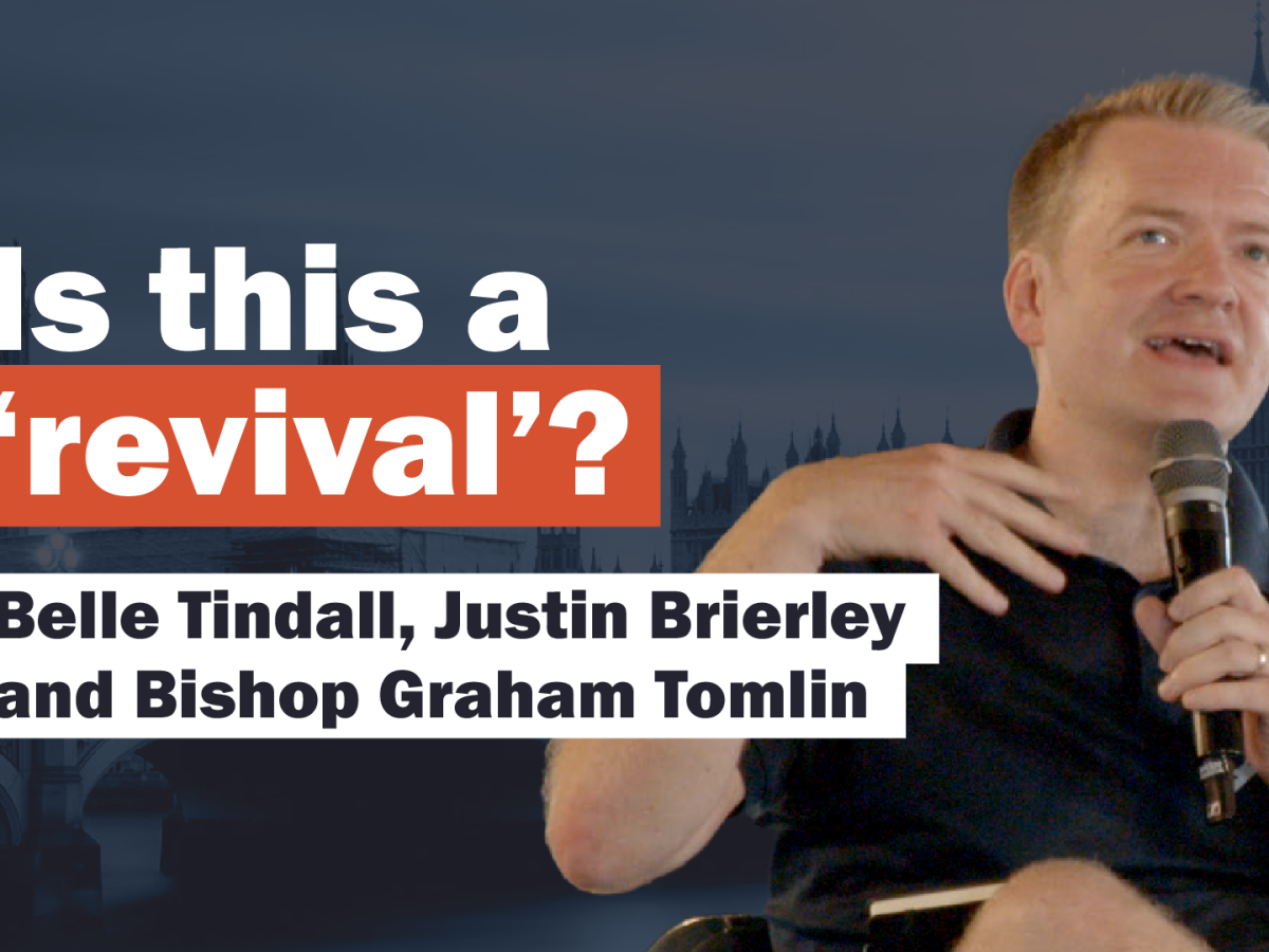 A video caption card show a speaker holding a mike and the text 'Is this a revival?'