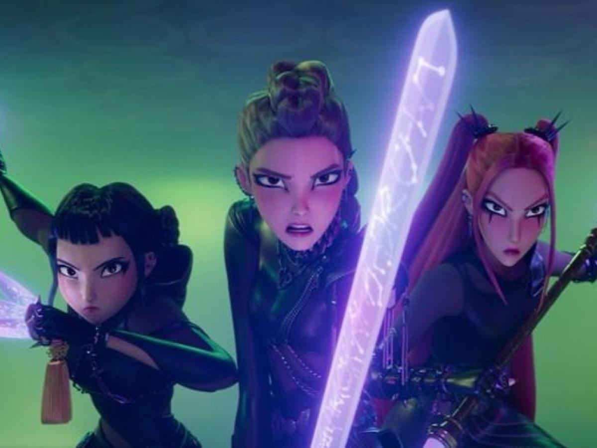 K-Popm Demon Hunters lean forward wielding weapons