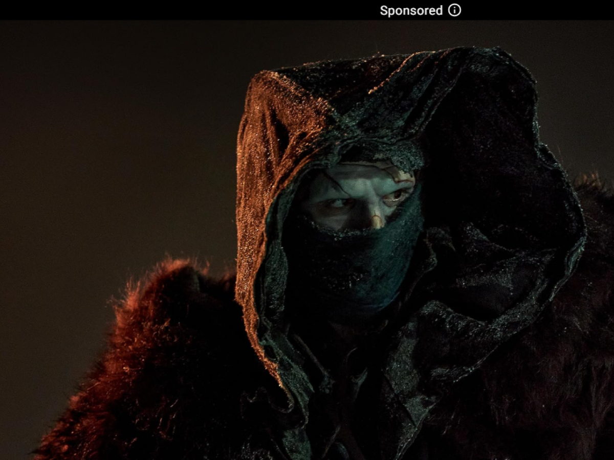 Frankstein stares our from his covered face.