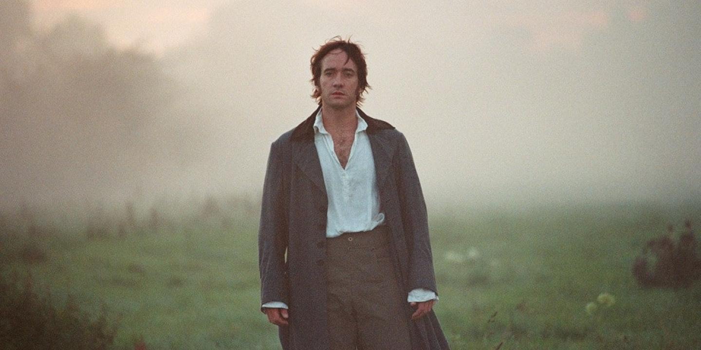 A man dressed in Georgian clothes walks out of the mist.