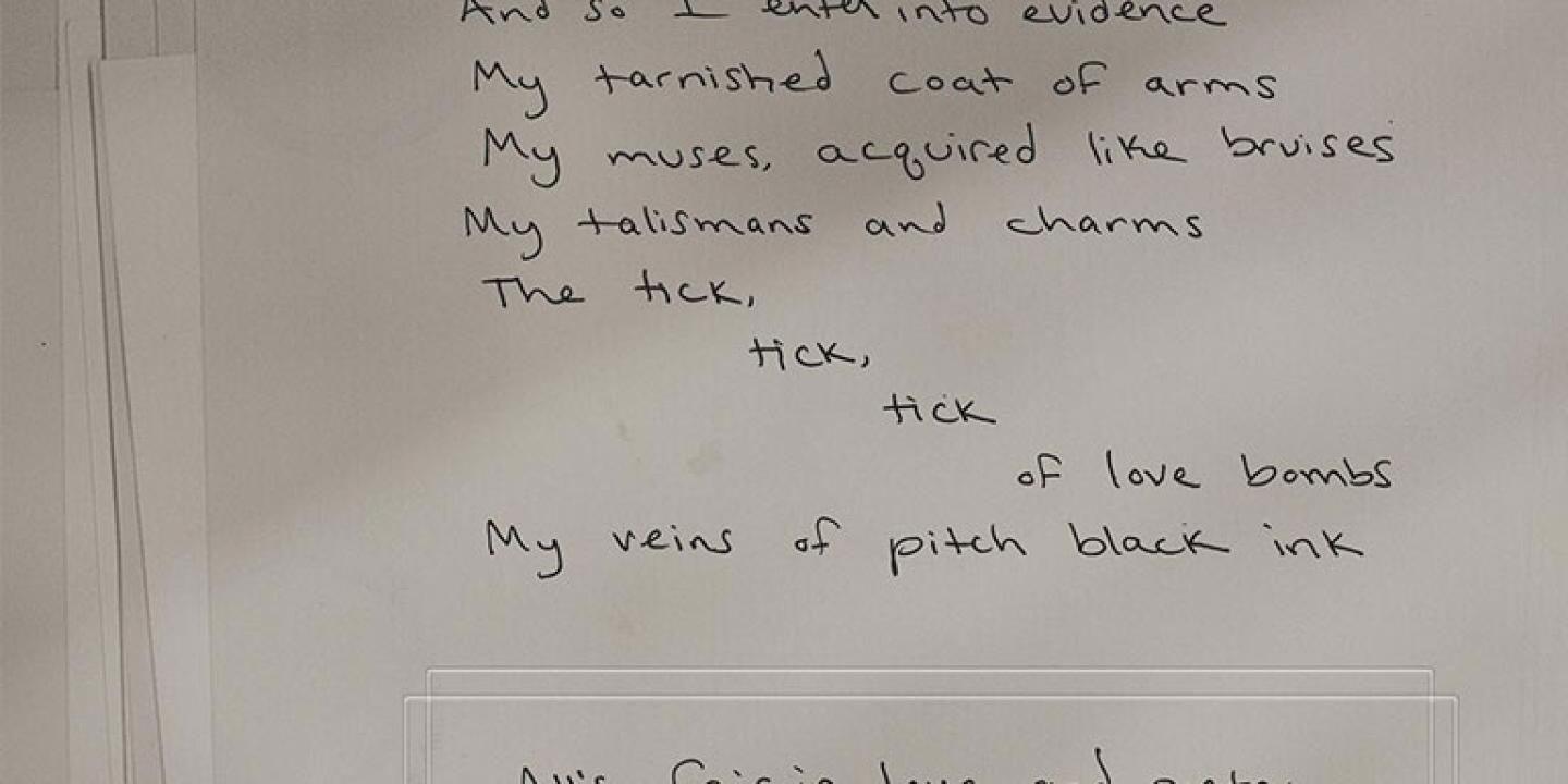 Hand-written poetry on a page