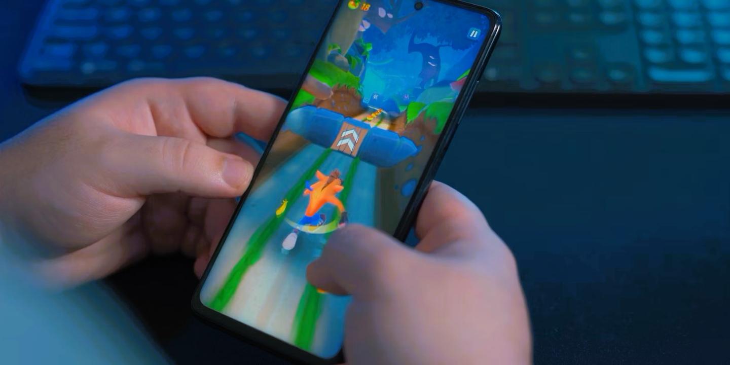A gamer plays on a phone.