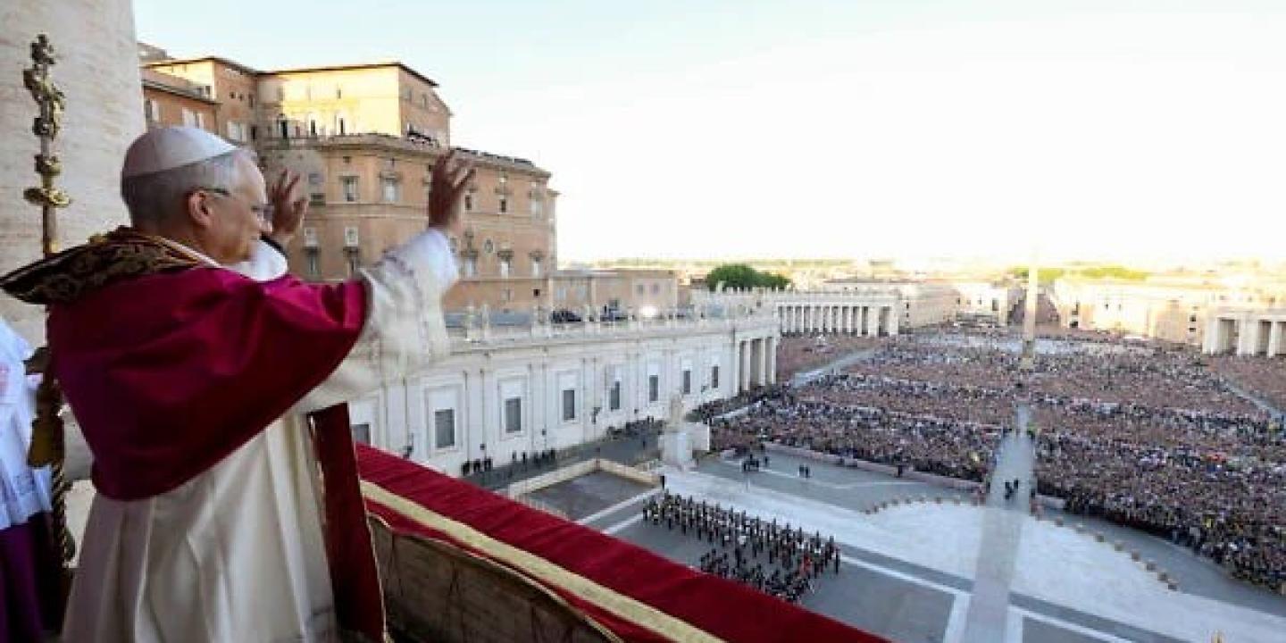 Pope Leo waves to the crowd.