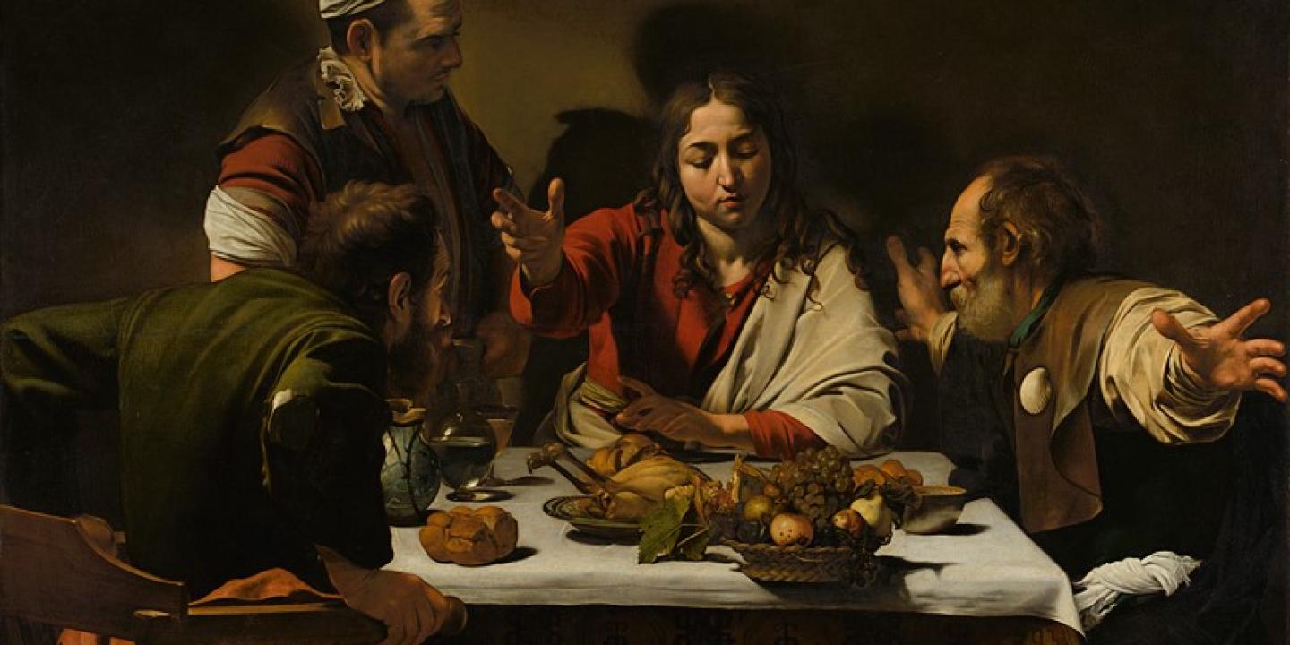 A painting depicts Jesus talking to disciples at a meal.