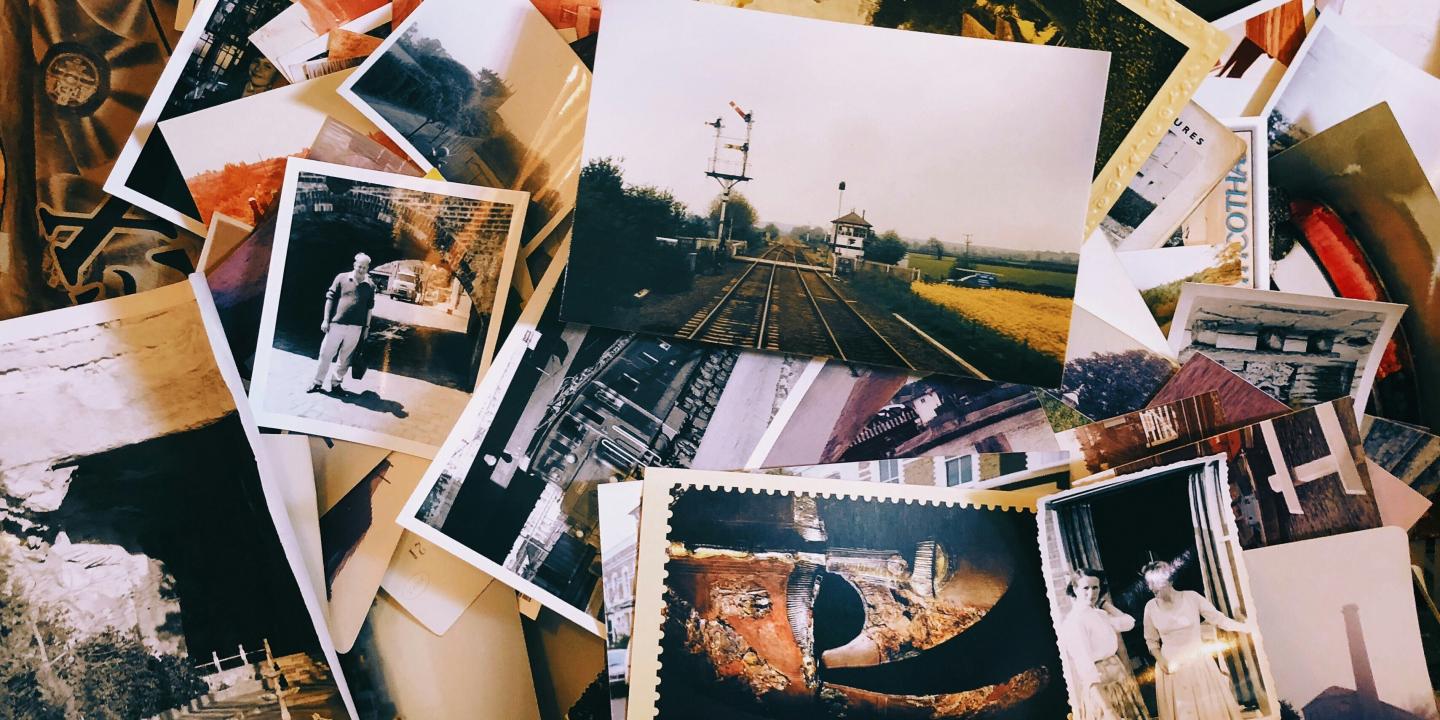 A jumbled pile of old photographs.