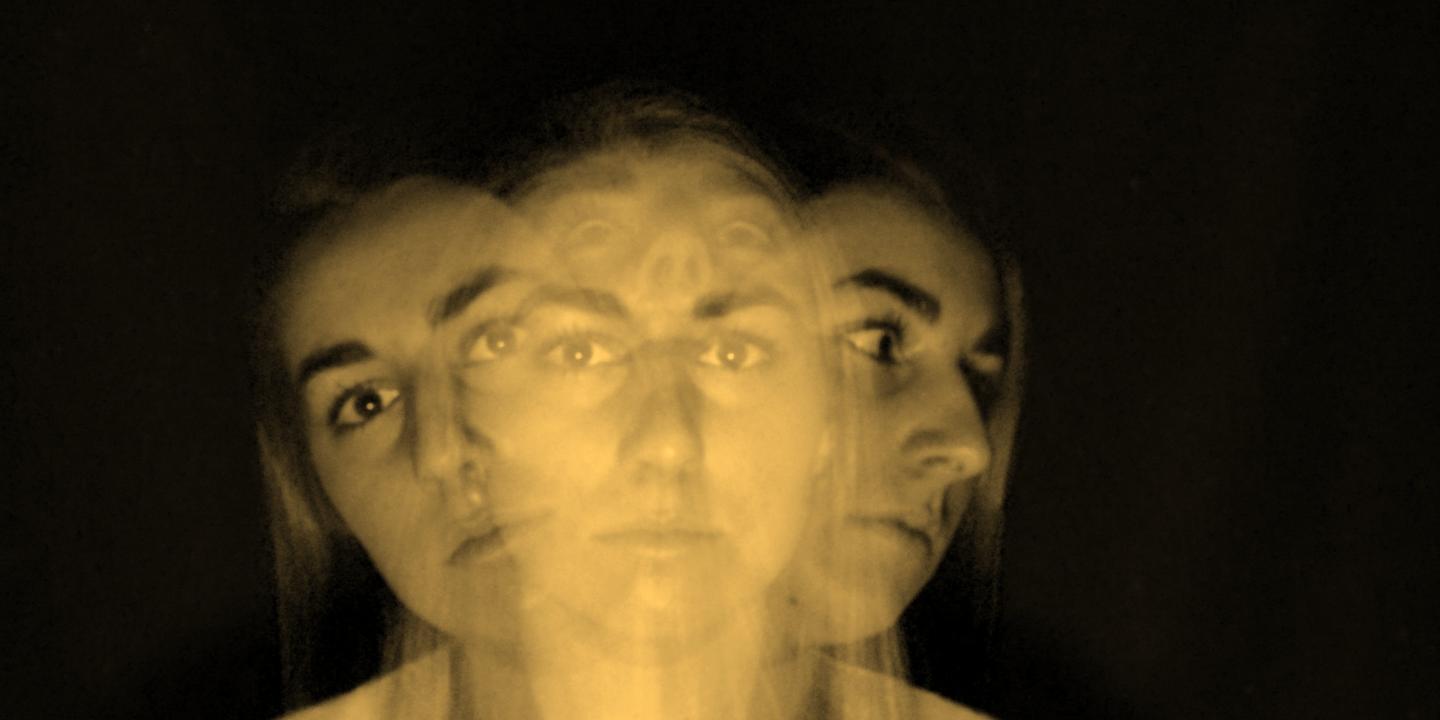 A multiple exposure image shows a womans head and shoulders looking ahead, to the sides and above.