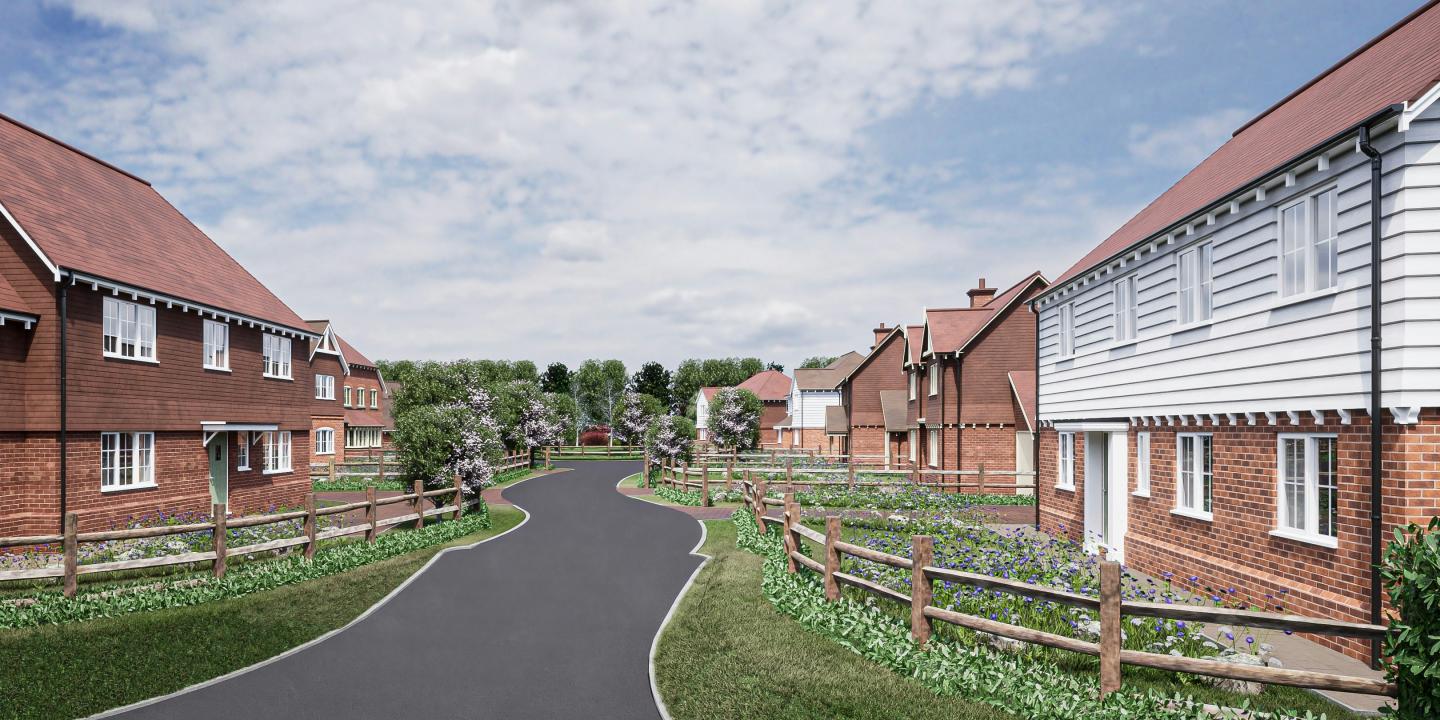 A render of a new housing estate showing a road, wooden fences and clapperboard hosues.