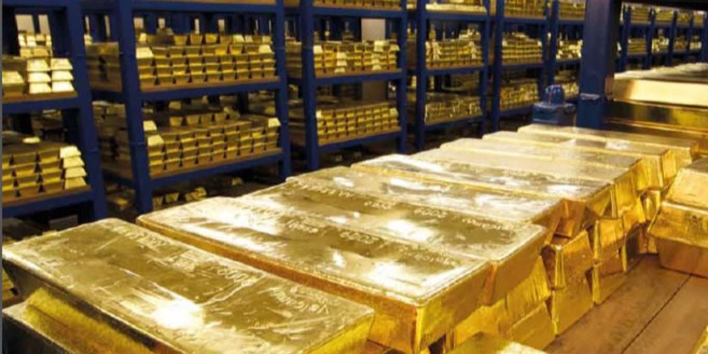 Gold bars stacked in the Bank of England vault.
