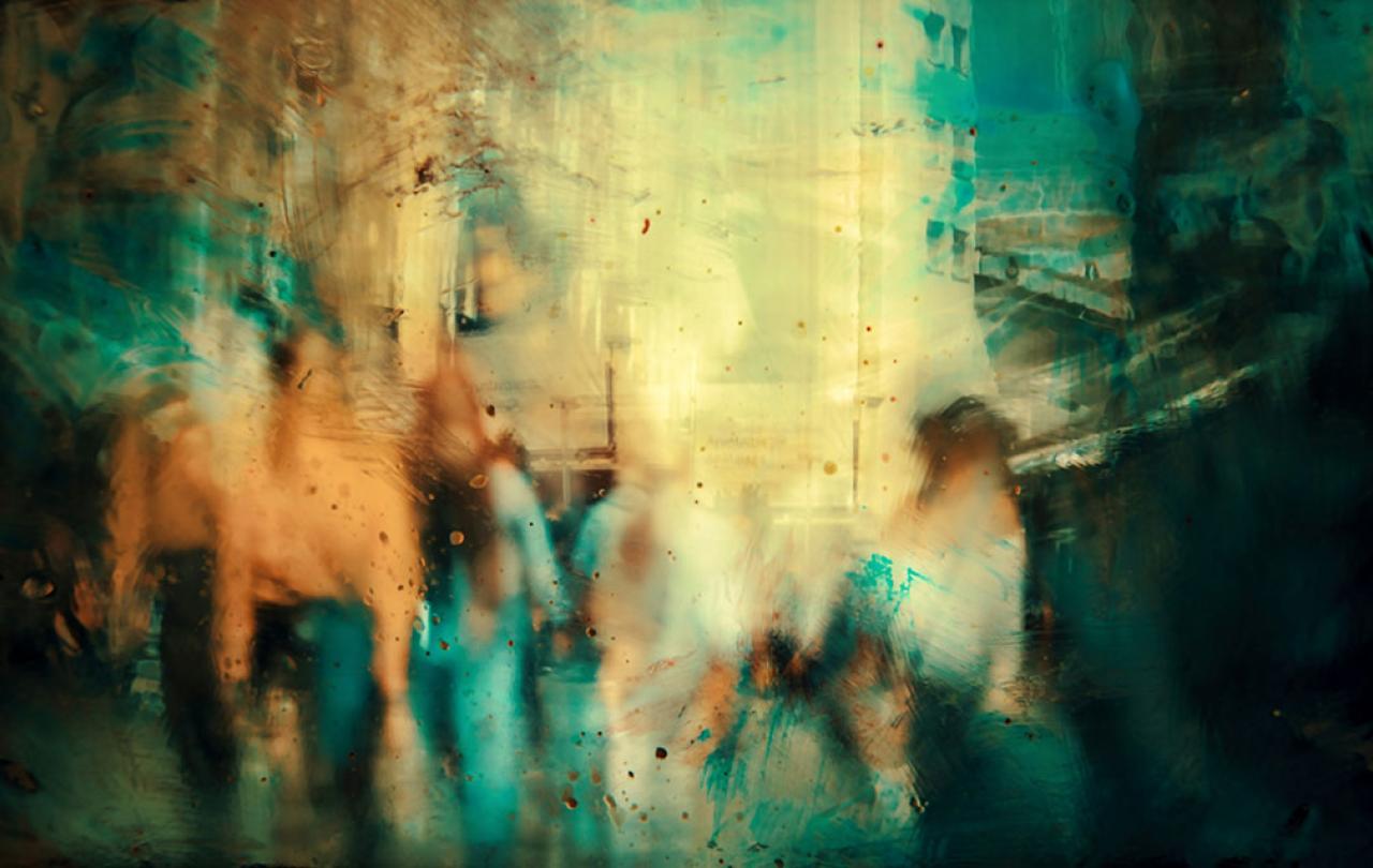 An almost abstract image with overlays of colour over a group of people standing.