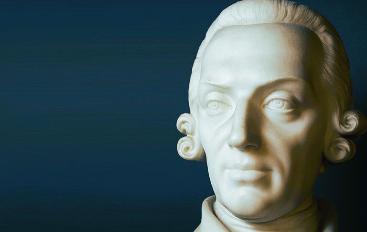 A statue of a Georgian man looks to the left.