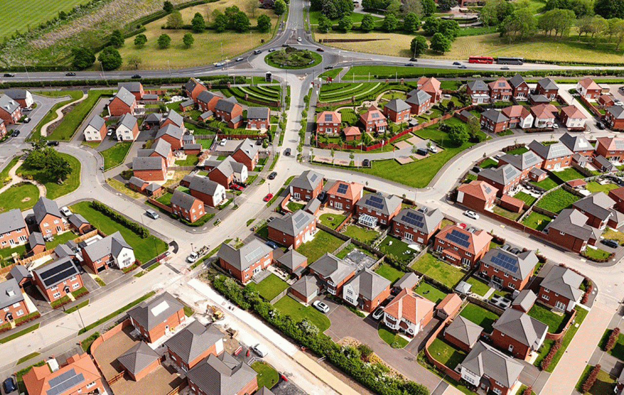 A CGI of a new housing estate viewed from above. 