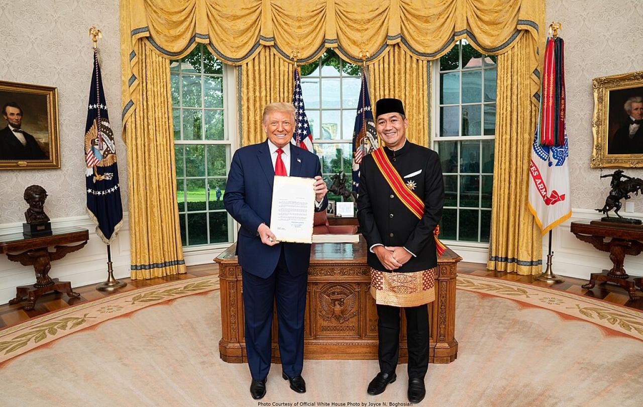 An ambassador presents credential to President Trump