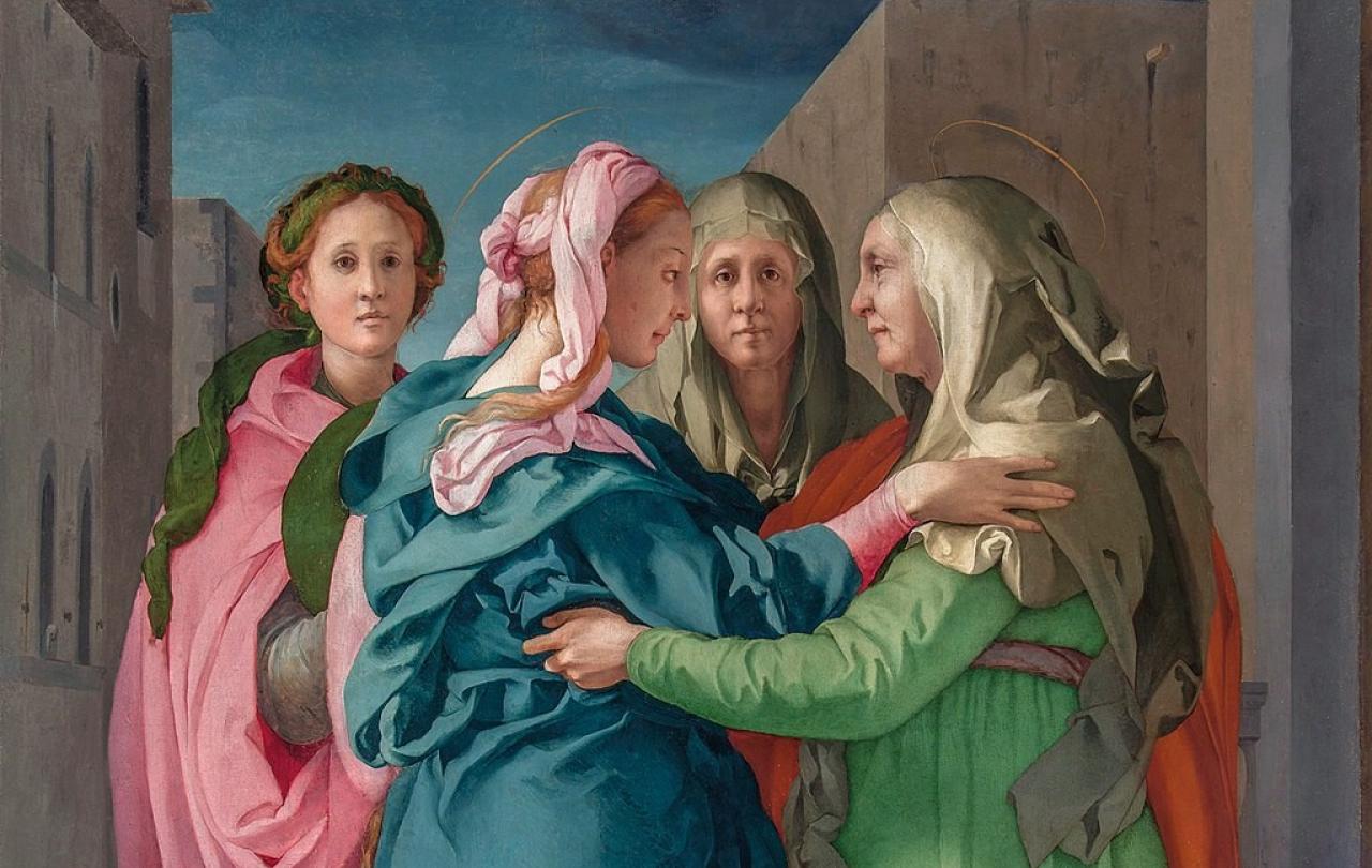 A Renaissance painting of Elizabeth greeting the Virgin birth show two woman reaching out to hug, while others look on.